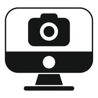 Computer displaying camera icon for online photography concept vector