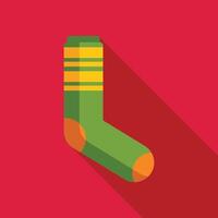 Green sock lying on red background with long shadow flat design icon vector
