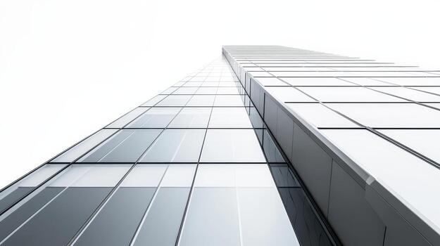A modern skyscraper viewed from below, emphasizing its sleek glass facade and height. photo