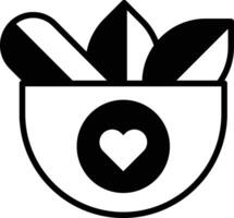 bowl with a heart on it and a bunch of leaves vector