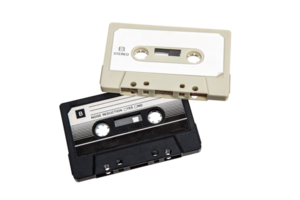 Close-up of an audio cassettes with a sticker without text. Analog storage medium. Cassettes for audio recordings and music. png