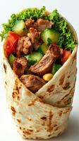 Close-up of a Tortilla Wrap with Grilled Meat, Cucumber, Lettuce, and Tomato photo