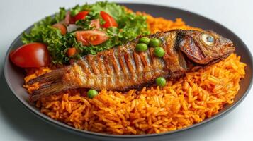 Fried Fish with Red Rice and Green Peas and Side Salad photo