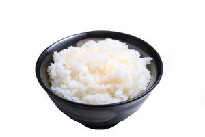 Japanese rice in earthen cup isolated on a white background photo