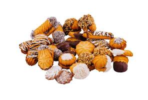 Pile of shortbread cookies with chocolate and nuts on white background photo