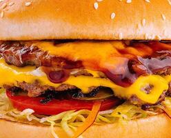 Juicy double cheeseburger close up background photo