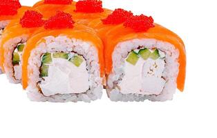 Philadelphia sushi roll topped with salmon and red caviar photo