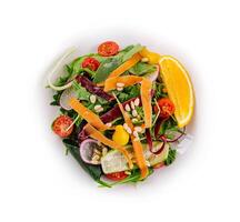 Fresh citrus mixed salad on white background photo