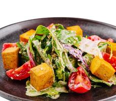 Fresh vegan salad with tofu and vegetables photo