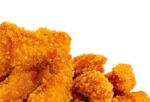 Crispy fried chicken strips on white background photo
