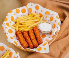 fast food feast on rustic background photo