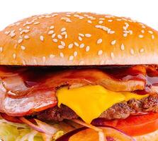 Delicious bacon cheeseburger on white background photo