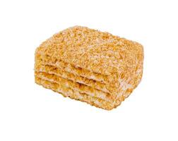 Delicious multi layered napoleon cake with crumb topping on white background photo