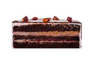 Delicious chocolate cake with nuts and cherry filling showing its layers photo