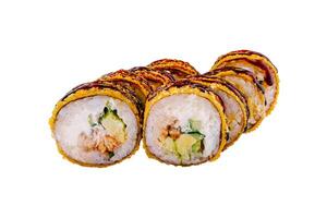 Tempura maki sushi rolls with smoked eel and cream cheese on white background photo
