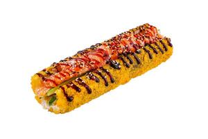 Tempura sushi roll with salmon and cucumber lying on white background photo