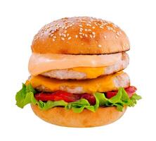 Double burger with lettuce, tomato, cheese and sauce on white background photo
