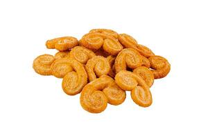 Pile of palmier cookies covered in granulated sugar isolated on white background photo