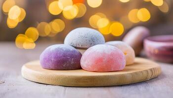 Delicious mochi on wooden board. Traditional Japanese dessert. Rice cake. Sweet and tasty food. photo