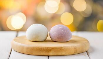 Delicious mochi on wooden board. Traditional Japanese dessert. Rice cake. Sweet and tasty food. photo