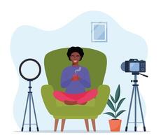 Blogger communicates in live stream with followers. Woman records sitting in armchair in a Lotus pose and holds a mug of hot drink in her hands. Influencer creating . illustration. vector
