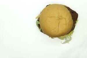 Top view of beef burger on white background photo