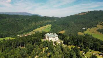 Aerial descending view of chateau Predna Hora in Slovakia in August 2024 video