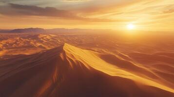 Sprawling desert landscape, captured from above by a drone. Patterns in the sand dunes with sharp shadows during the golden hour, giving a dramatic and expansive view. photo