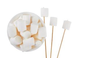 Marshmallow on wooden stick photo