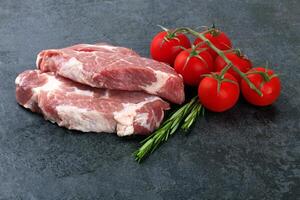 Meat on black surface photo