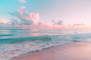 A gentle wave crashes onto a sandy beach at sunset creating a dreamy pastel scene photo