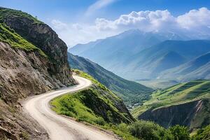 Twisting Mountain Road with Sharp Hairpin Curves and Breathtaking Valley Views, Framed by a Clean White Background photo
