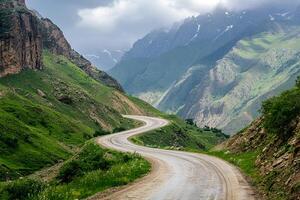 Twisting Mountain Road with Sharp Hairpin Curves and Breathtaking Valley Views, Framed by a Clean White Background photo