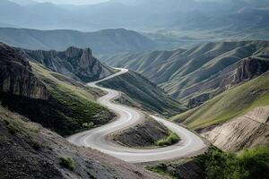 Twisting Mountain Road with Sharp Hairpin Curves and Breathtaking Valley Views, Framed by a Clean White Background photo