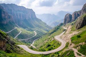 Twisting Mountain Road with Sharp Hairpin Curves and Breathtaking Valley Views, Framed by a Clean White Background photo