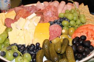 Meat And Veggie Tray On A Table For Eating photo