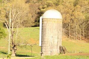 Rural Farm With Silo In The Background photo