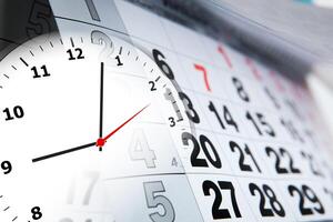 wall calendar with the number of days and clock photo