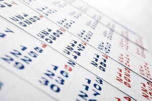sheets of wall calendar with the number of days photo