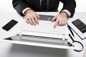human fingers on the notebook keyboard 3 photo