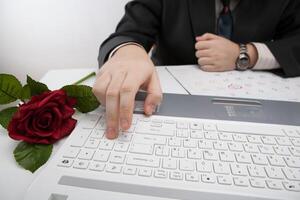 man working at his laptop photo