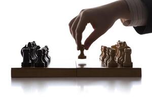 man makes a move chess pawn photo