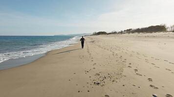 Man Sport Running On The Beach Near The Ocean Water In Calabria video