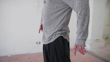Movements Of A Man Dancer In A Closed Structure With His Hands video