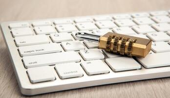 Padlock on a computer keyboard Internet security concept photo