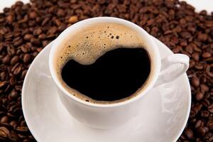 cup of black coffee with foam photo