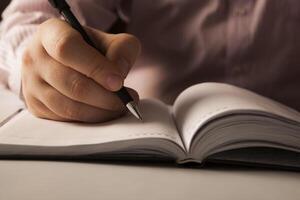 man is preparing for written work photo