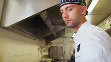 Young Chefs Prepare Pasta In A Kitchen Canteen video