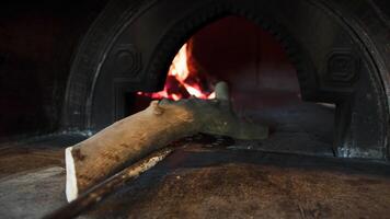 Adding Wood Into The Pizza Oven video