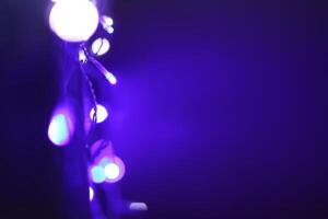 Abstract bokeh background. Blurred garland lights. photo